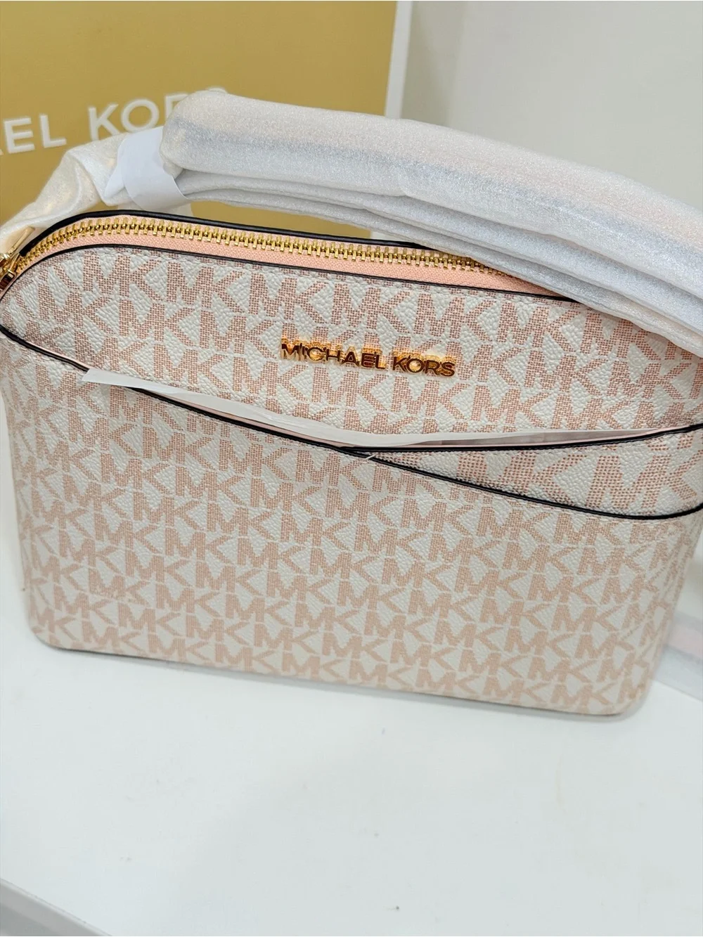 Michael Kors Jet Set Travel Medium Logo Dome Crossbody Bag in the powder blush